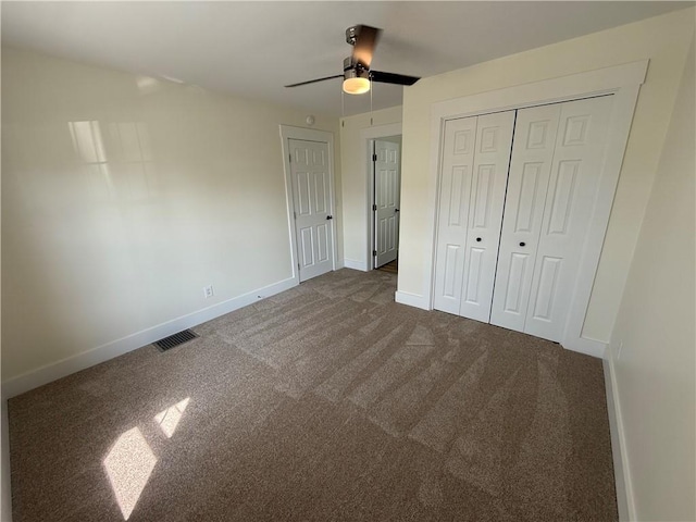 801 9th Ave, Brackenridge, PA 15014 - unfurnished bedroom with dark colored carpet, a ceiling fan, and a closet
