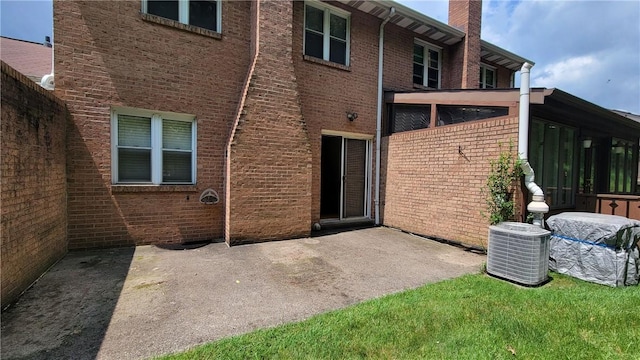 402 Forest Ridge Dr, Forest Hills Boro, PA 15221 - back of house featuring a patio, brick siding, and a chimney