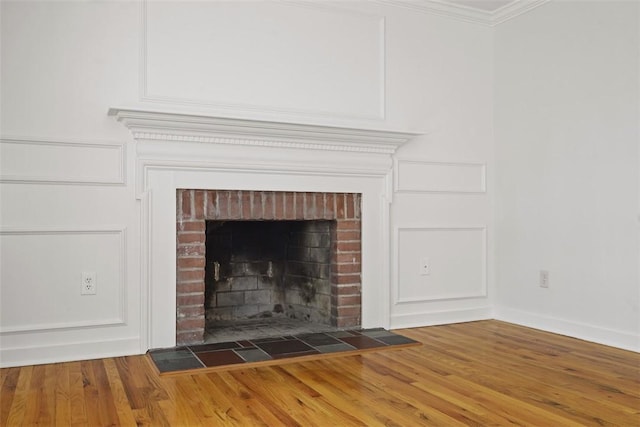 195 Grandview Dr N, Fox Chapel, PA 15215 - detailed view of crown molding, a fireplace, and wood finished floors