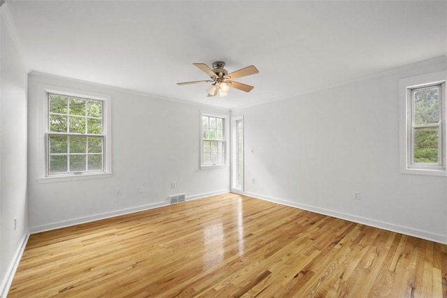 195 Grandview Dr N, Fox Chapel, PA 15215 - unfurnished room featuring plenty of natural light, light wood finished floors, ceiling fan, and crown molding