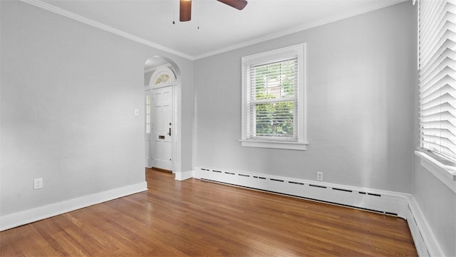 148 Stanton Ct E, Stanton Heights, PA 15201 - empty room featuring wood finished floors, a baseboard radiator, a ceiling fan, ornamental molding, and arched walkways