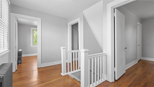 148 Stanton Ct E, Stanton Heights, PA 15201 - hallway featuring radiator, an upstairs landing, and wood finished floors