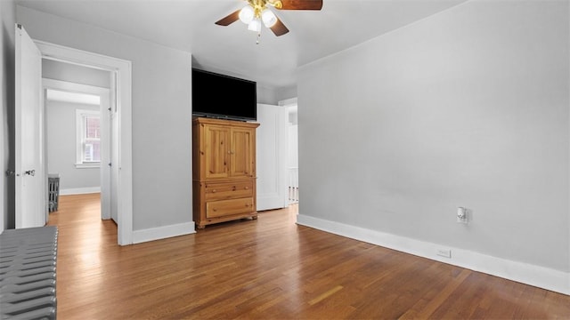 148 Stanton Ct E, Stanton Heights, PA 15201 - unfurnished bedroom featuring wood finished floors and a ceiling fan