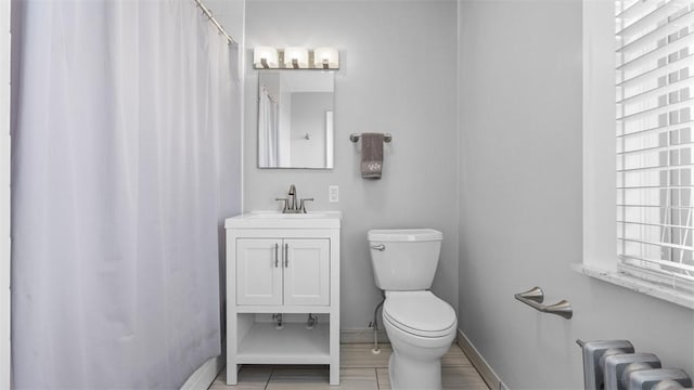 148 Stanton Ct E, Stanton Heights, PA 15201 - bathroom featuring radiator heating unit and vanity