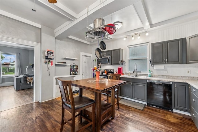 528 Spring St, Latrobe, PA 15650 - kitchen with appliances with stainless steel finishes, gray cabinetry, dark wood finished floors, light countertops, and beamed ceiling
