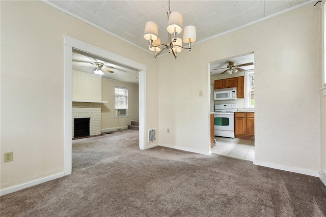 349 Avenue E Ave E, Forest Hills Boro, PA 15221 - unfurnished dining area featuring ceiling fan, light colored carpet, crown molding, a chandelier, and a fireplace
