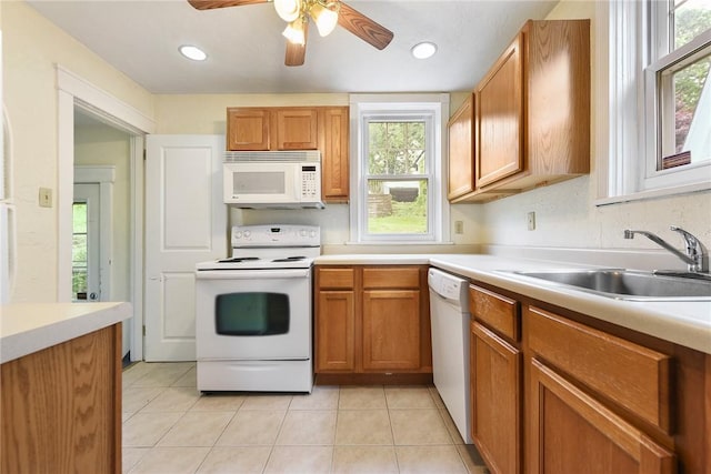 349 Avenue E Ave E, Forest Hills Boro, PA 15221 - kitchen featuring white appliances, light countertops, light tile patterned flooring, healthy amount of natural light, and recessed lighting