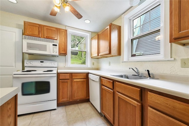 349 Avenue E Ave E, Forest Hills Boro, PA 15221 - kitchen featuring white appliances, light tile patterned floors, and light countertops