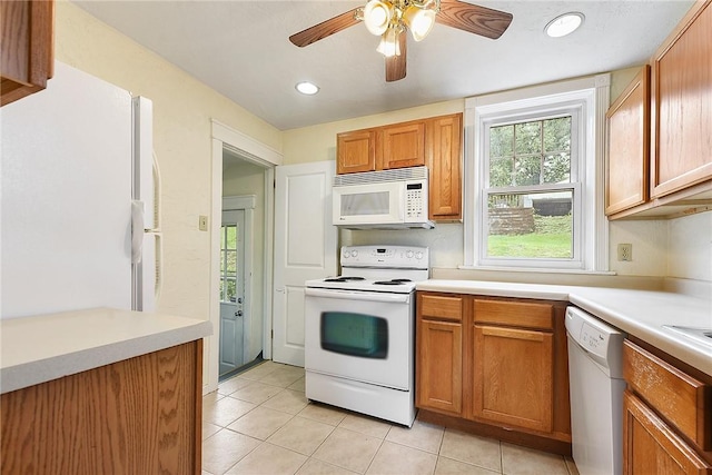 349 Avenue E Ave E, Forest Hills Boro, PA 15221 - kitchen with white appliances, light tile patterned floors, light countertops, plenty of natural light, and recessed lighting