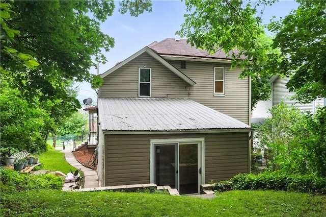 39 Danvers Ave, Ingram, PA 15205 - back of house with a lawn and a metal roof