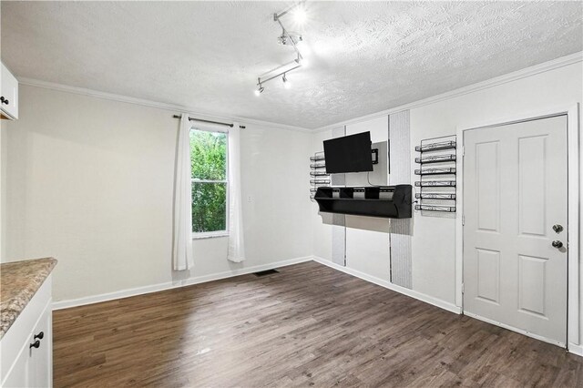 39 Danvers Ave, Ingram, PA 15205 - kitchen with wood finished floors, crown molding, a textured ceiling, white cabinetry, and rail lighting