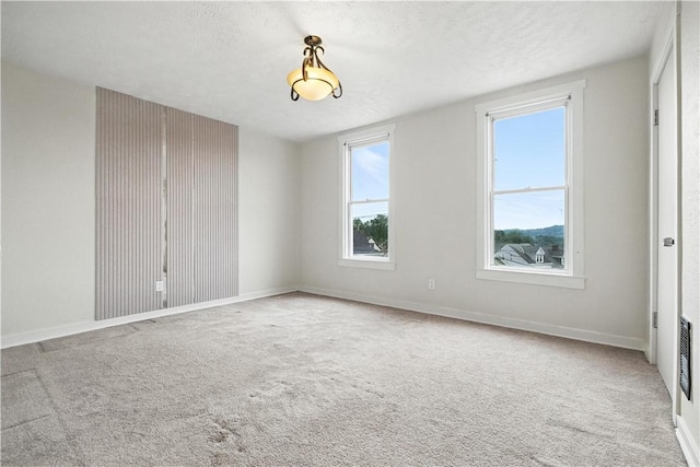 39 Danvers Ave, Ingram, PA 15205 - carpeted empty room featuring a textured ceiling and baseboards