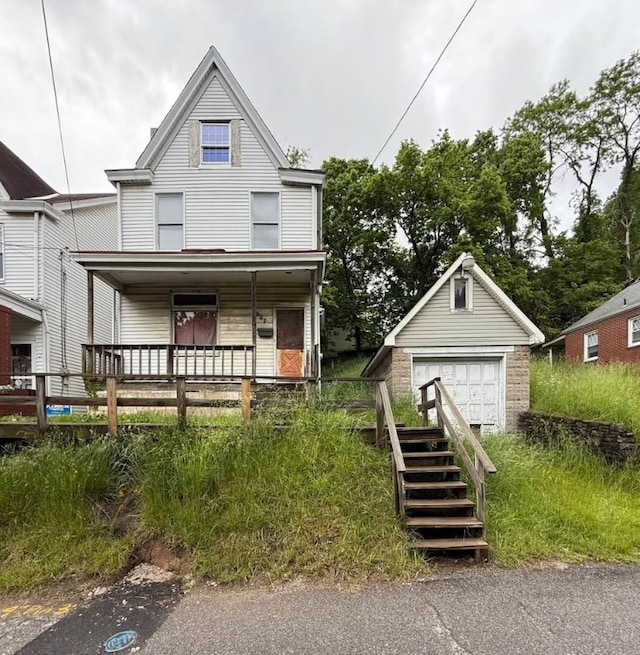 4007 Portman Ave, Observatory Hill, PA 15214 - view of front facade featuring a garage, an outbuilding, and covered porch