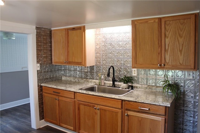 400 E Butler St, Mercer Boro Mer, PA 16137 - kitchen featuring dark wood finished floors, brown cabinets, and backsplash