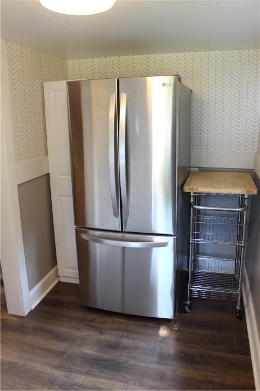 400 E Butler St, Mercer Boro Mer, PA 16137 - kitchen view of freestanding refrigerator, wallpapered walls, and dark wood-style floors