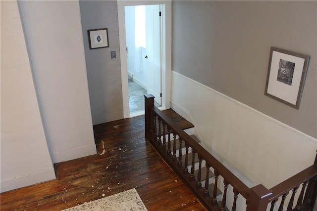 400 E Butler St, Mercer Boro Mer, PA 16137 - hall with wood-type flooring, a wainscoted wall, and stairs