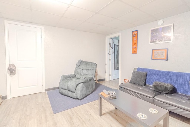 5801 Lincoln Ave, Export, PA 15632 - living room featuring a drop ceiling and light wood-type flooring