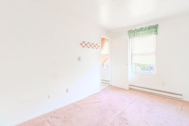 5801 Lincoln Ave, Export, PA 15632 - carpeted empty room with a baseboard heating unit