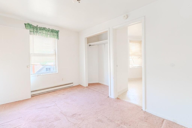 5801 Lincoln Ave, Export, PA 15632 - unfurnished bedroom featuring a baseboard heating unit and carpet