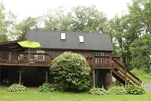 130 Hall Rd, Findley Twp, PA 16137 - back of house featuring a wooden deck, stairway, log exterior, roof with shingles, and a chimney