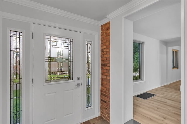 494 Highview Rd, Baldwin Twp, PA 15228 - entryway with brick wall, wood finished floors, and crown molding