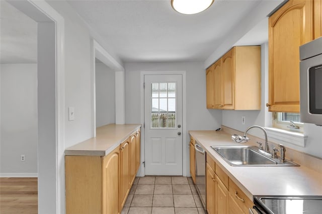 494 Highview Rd, Baldwin Twp, PA 15228 - kitchen with stainless steel appliances, light countertops, and light brown cabinetry