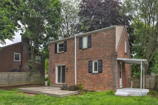 494 Highview Rd, Baldwin Twp, PA 15228 - rear view of house with brick siding and a patio