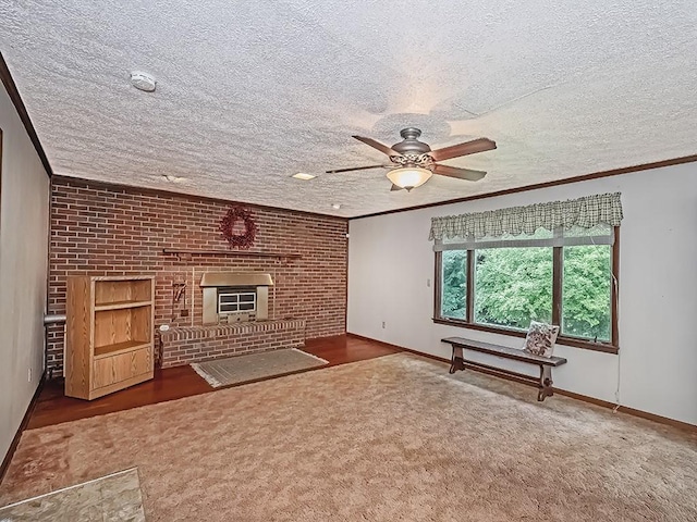2665 Warrendale Bayne Rd, Marshall, PA 15005 - unfurnished living room featuring carpet floors, a fireplace, a ceiling fan, a textured ceiling, and ornamental molding