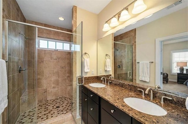 323 Osona Ln, Marshall, PA 16046 - ensuite bathroom with double vanity, a stall shower, and recessed lighting