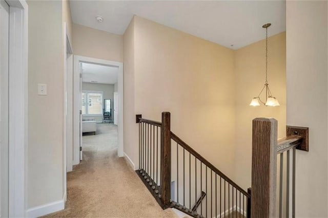 323 Osona Ln, Marshall, PA 16046 - hall with an upstairs landing and carpet flooring