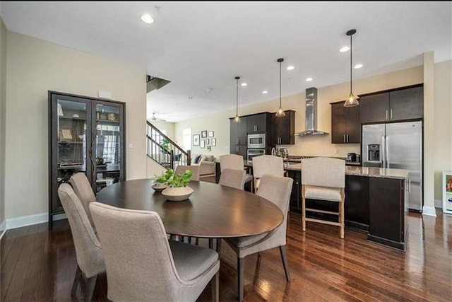 323 Osona Ln, Marshall, PA 16046 - dining space with dark wood-type flooring, recessed lighting, and stairway