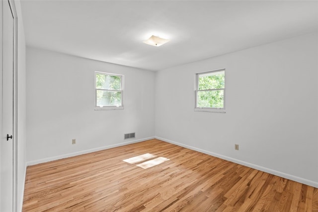 103 Drood Ln, Ross Twp, PA 15237 - unfurnished room with healthy amount of natural light and light wood finished floors