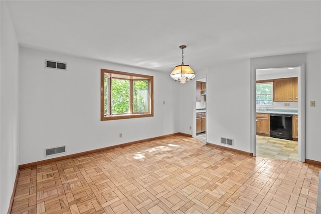 103 Drood Ln, Ross Twp, PA 15237 - spare room with baseboards and a chandelier
