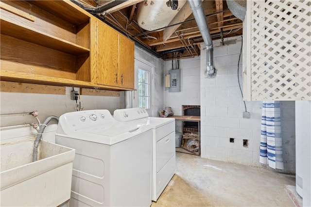 130 Clare Dr, South Strabane, PA 15301 - laundry area with washing machine and dryer, cabinet space, electric panel, and concrete block wall