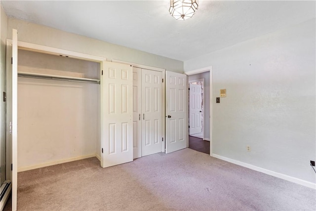 130 Clare Dr, South Strabane, PA 15301 - unfurnished bedroom with carpet floors and a baseboard heating unit