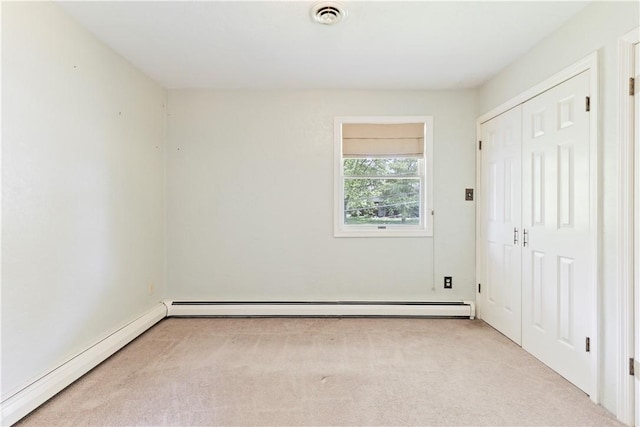 130 Clare Dr, South Strabane, PA 15301 - unfurnished bedroom with carpet, a baseboard radiator, baseboard heating, and a closet