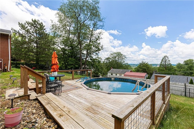 130 Clare Dr, South Strabane, PA 15301 - view of swimming pool with a wooden deck and outdoor dining area