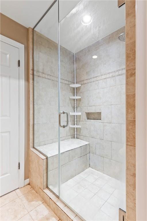 130 Clare Dr, South Strabane, PA 15301 - bathroom featuring a stall shower and tile patterned floors