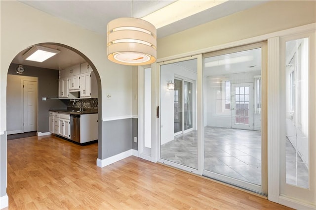 130 Clare Dr, South Strabane, PA 15301 - unfurnished room featuring arched walkways and light wood finished floors