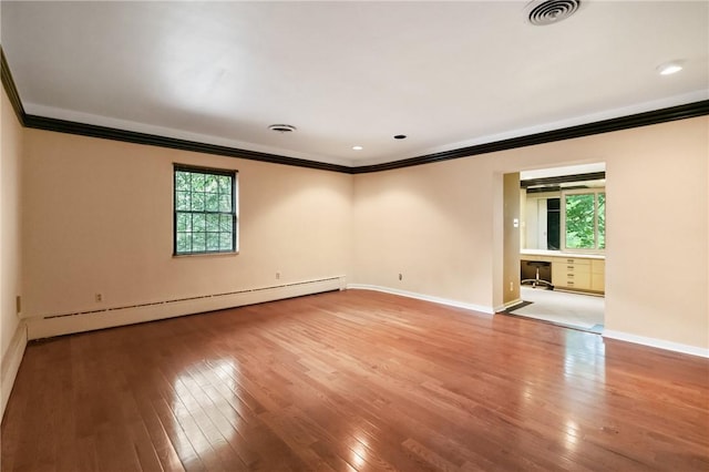 5401 Guarino Rd, Squirrel Hill, PA 15217 - unfurnished room featuring ornamental molding, a baseboard heating unit, plenty of natural light, hardwood / wood-style flooring, and recessed lighting