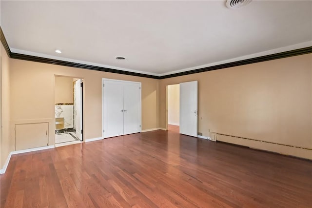 5401 Guarino Rd, Squirrel Hill, PA 15217 - unfurnished bedroom featuring crown molding, wood finished floors, a baseboard radiator, recessed lighting, and ensuite bathroom