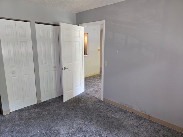 1987 Centurion Dr Unit 202, Forest Hills Boro, PA 15221 - unfurnished bedroom featuring carpet floors, multiple closets, and a textured ceiling