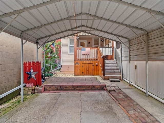 view of parking with a detached carport