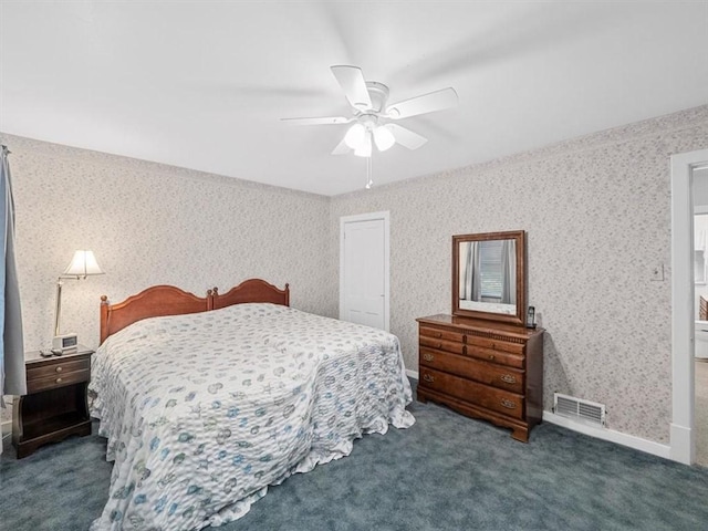 carpeted bedroom featuring a ceiling fan