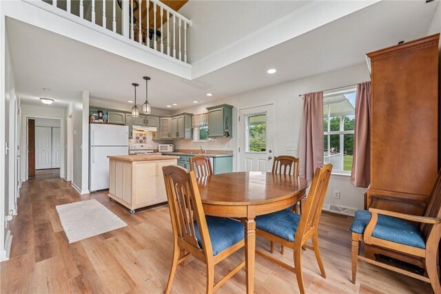 135 Preacher Rd, East Huntingdon, PA 15639 - dining space with light wood-type flooring and recessed lighting