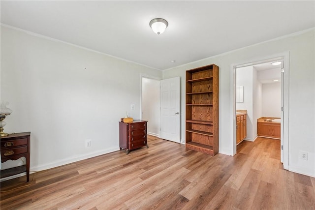 135 Preacher Rd, East Huntingdon, PA 15639 - bedroom featuring light wood-type flooring, ornamental molding, and ensuite bathroom