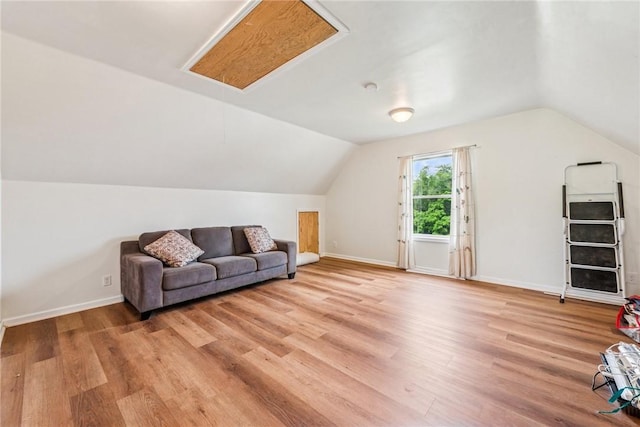 135 Preacher Rd, East Huntingdon, PA 15639 - additional living space with lofted ceiling, light wood-type flooring, and attic access