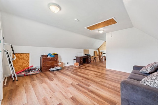 135 Preacher Rd, East Huntingdon, PA 15639 - office space with light wood-style floors, vaulted ceiling, and attic access