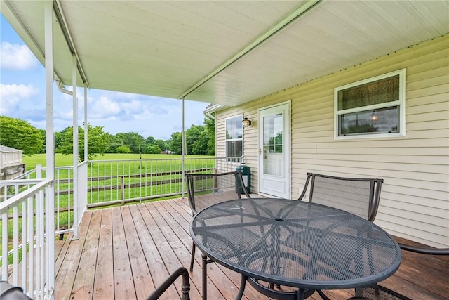 135 Preacher Rd, East Huntingdon, PA 15639 - wooden deck with outdoor dining space and view of wooded area