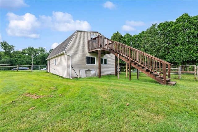 135 Preacher Rd, East Huntingdon, PA 15639 - rear view of property featuring stairs, a deck, a gambrel roof, and roof with shingles